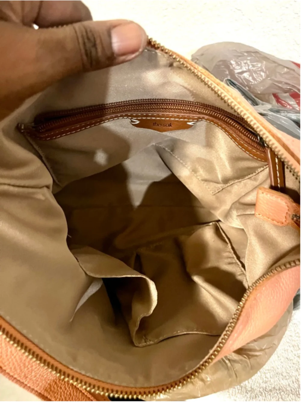 The Sak Jasmine orange leather hobo crossbody bag